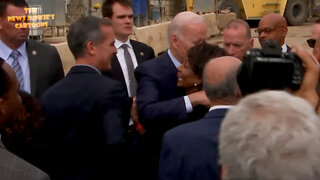 Biden hugs his fellow Dems.