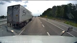 Cyclist Riding On Highway 401