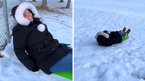 Little Girl Makes Hilarious Comment While Mom Slides On Snow