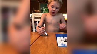 Boy Hilariously Fails To Erase Permanent Marker