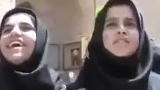 Students are speaking to a tourist in Iran