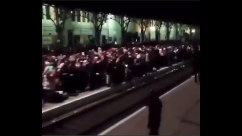 Thousands of Ukrainian refugees awaiting at a Lviv train station.