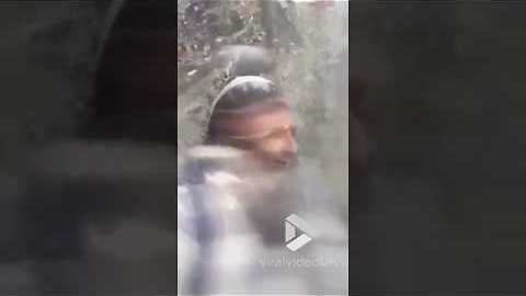 Men Observe Avalanche From A Distance As Clouds Of Powder Come Close