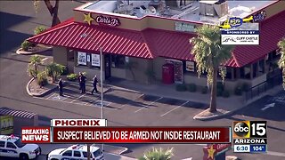 Suspect believe to be armed not inside restaurant