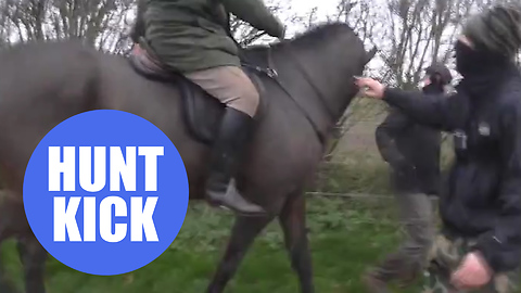 Landowner on horseback is involved in an angry confrontation with hunt saboteurs