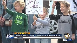 Parents protest over stalled construction