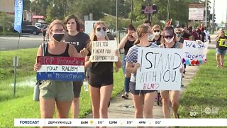 Protesters march peacefully through Plant City, pray outside police headquarters