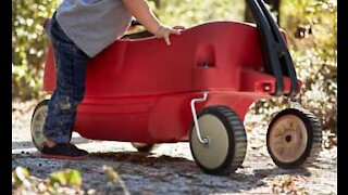 Woman stuck in child's race car