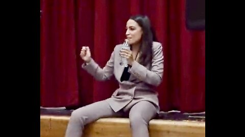 AOC dances as angry crowd shouts at her