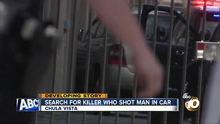 Search for killer who shot man in car