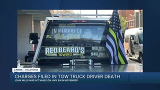 Charges filed in tow truck drivers death