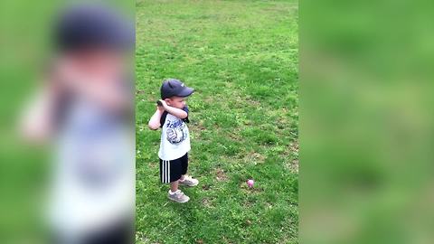 Tot Boy Spins Around In A Circle When He Tries To Hit A Ball With A Golf Club