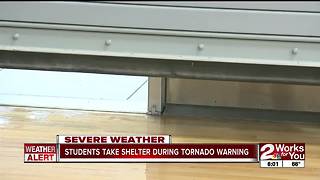 Students take shelter during tornado warning