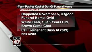 Police looking for person seen wheeling casket from funeral home
