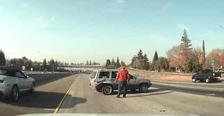Out of control jeep reverses across the highway
