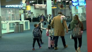 Holiday travel is down, but people are still flying out of Mitchell airport