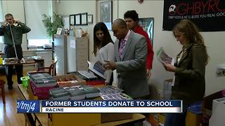 Former Racine school students donate supplies to Julian Thomas Elementary principle