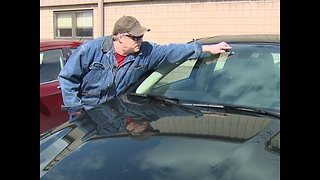 Elyria man angry after cars damaged by truck debris