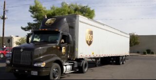 UPS drivers save man from underneath semi-truck