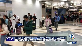 Fort Lauderdale-Hollywood International Airport open, but major flight delays after flash flooding