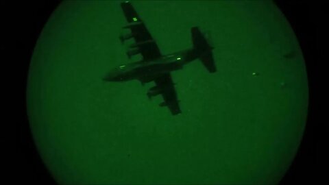 U.S. Marines Receive a Supply Drop from a U.S. Air Force MC-130J