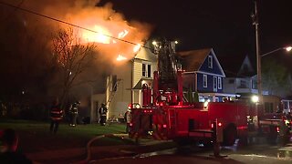 Cleveland firefighters battle house fire early Friday morning