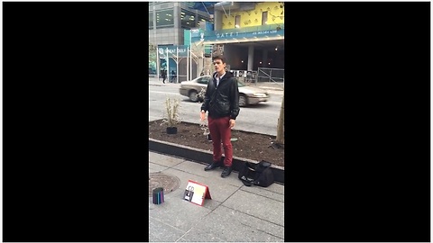 Unexpected street singer leaves pedestrians in awe!