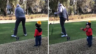 This golfer has the cutest supporter ever