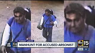 Manhunt for accused arsonist who opened fire on a forest service employee