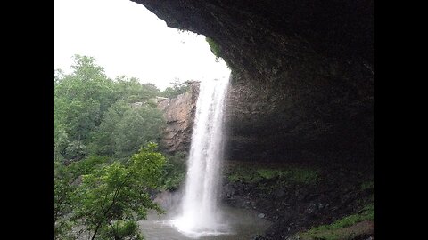 Behind the waterfall