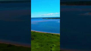 Flying over an island on the beach