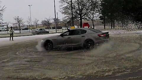 Supercar club can't resist drifting in snowy parking lot