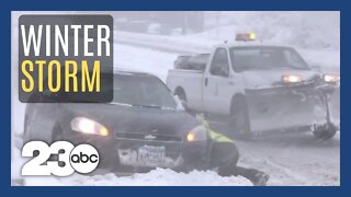 Winter storm rips across U.S. dumping rain, snow