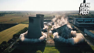 300-foot cooling towers come crashing down