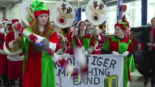 Akron High School marching band spreading holiday cheer in Buffalo