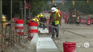 Outdoor workers brave the heat as temperatures rise across metro Detroit