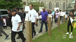 Community walk held for T-Mobile worker killed in robbery