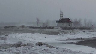 Blizzard pounds the coastline of Lake Ontario in Toronto