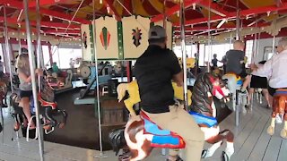 Rob & Carol Allen making "magical" memories at Olcott Beach Carousel Park