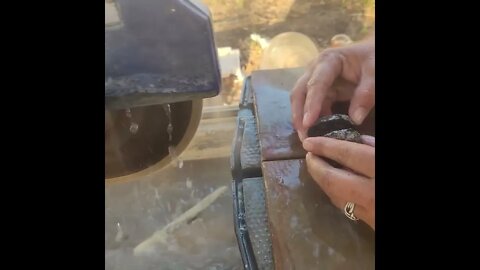 Sawing a smoky geode.