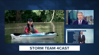 Susan Kim kayaks through flooding in Waukesha park