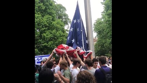 Students at UNC Chapel Hill Pulitzer Hall protect American Flag from anti-American protesters