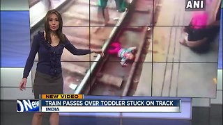Train passes over child struck on track