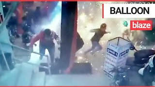 Shocking moment balloon seller causes inferno at Christmas market