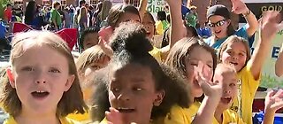 Students participating in farmers market