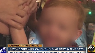 Creepy! Stranger holds toddler inside Valley home