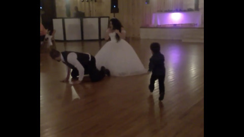 Funny kid helps Groom find garter