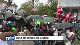 Support grows for woman hula-hooping for victims of violent, unsolved murder