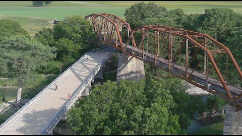2021 Tour de Boerne - Drone View of Riders at Abandoned Iron Railroad Bridge & River Bend Park