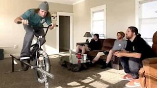 Guy shows off BMX skills in house during quarantine